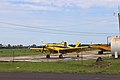 Yellow crop dusting plane N736LA