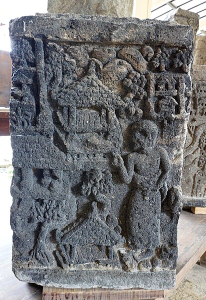 File:043 Relief, Woman and Houses, Museum Mojopahit (38618659350).jpg