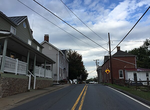 View west along Maryland State Route 107 (Fisher Avenue) at Norris Road