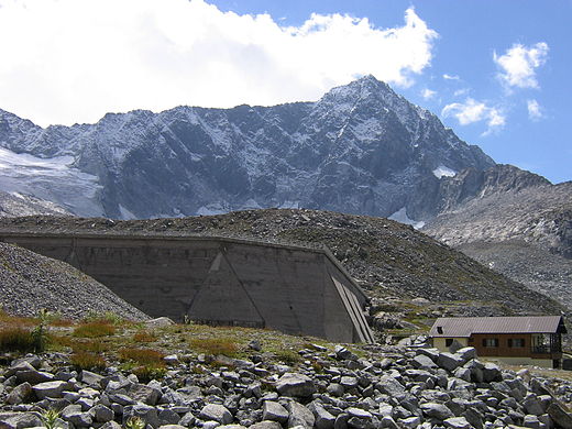 Mount Adamello's North face with Venerocolo dam in the foreground