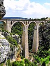 Varda Viaduct, spanning over a ravine in the Taurus Mountains, was built in 1912 as part of the Berlin–Baghdad railway project. It still conveys freighter and passenger traffic between Central Anatolia