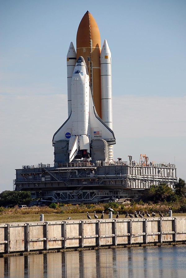 The Space Shuttle Atlantis is carried atop the MLP-2 in the lead-up to STS-117