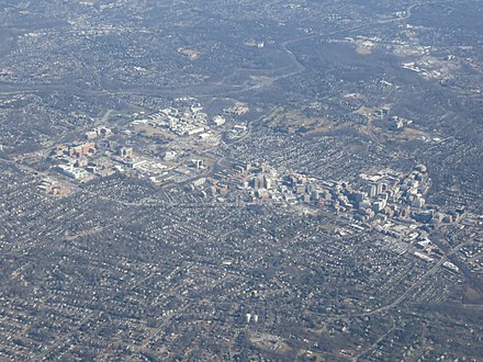 Aerial view of Downtown Bethesda at bottom right, with the National Institutes of Health campus at upper left and Walter Reed National Military Medical Center campus to the right