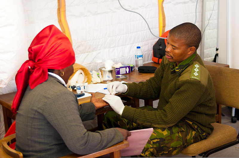 File:Botswana Defence Force Capt. Thapelo Dikolobe, right, a laboratory technician, performs basic blood testing during the second of four humanitarian civilian assistance events as part of Southern Accord 2012 120809-Z-LQ368-024.jpg