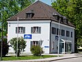 Geschäftsstelle der Volkshochschule an der Rathausstraße 1 in Bruckmühl, Landkreis Rosenheim, Regierungsbezirk Oberbayern, Bayern.