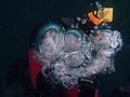 Bubbles of exhaled gas above a scuba diver P8210241.jpg