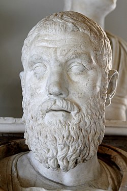 White statue of a bearded man