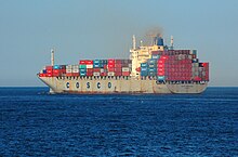 A COSCO container ship sails from Boston Harbor. COSCO Freighter.jpg