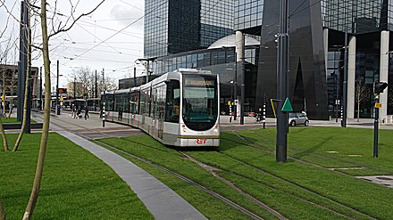 A RET tram leaves the Stationsplein