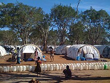 Menik Farm camp, June 2009 DFID-funded, UNHCR emergency shelter tents, in the IDP camp at Menik Farm, Sri Lanka (3694081492).jpg