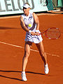 French-speaking player and former WTA No. 3 Elena Dementieva hitting backhand at the 2009 French Open. Despite her serve, she's generally considered the best Russian women's player to never win a GS title.