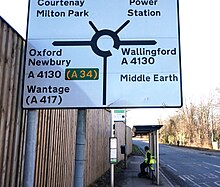 The name Middle Earth was added to this Didcot road sign by anonymous artist Athirty4