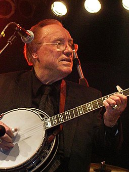 Earl Scruggs (pictured in later life) collaborated with Lester Flatt on the chart-topper "The Ballad of Jed Clampett". Earl Scruggs 2005.JPG