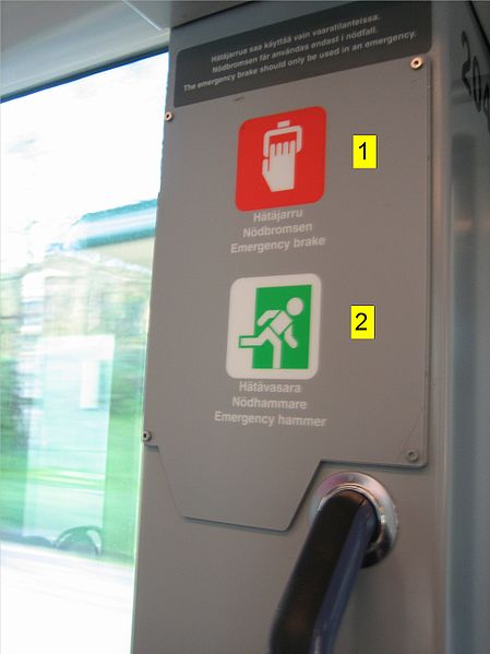 File:Emergency brake and emergency hammer next to the door in a tram.jpg