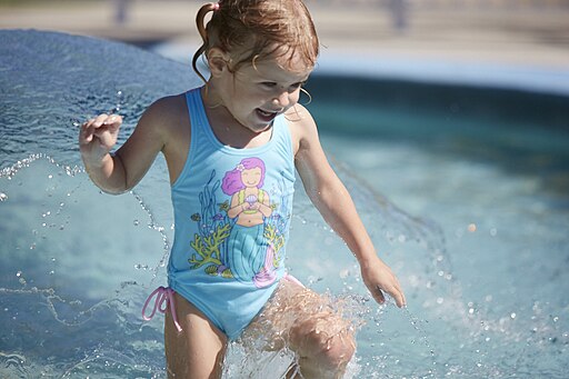 Girl playing in the water at the Hibiscus Sports Complex, Brisbane