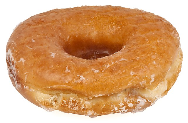 A glazed, yeast-raised, American-style ring doughnut
