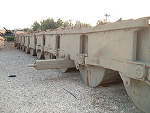 The Israeli "roller bridge", designed to be swiftly deployed on the canal. The fighting at the Chinese Farm meant the bridge reached the canal only after the pontoon bridge had already been deployed. Glilim bridge 3-Latrun.JPG