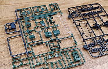 Model parts attached to sprue trees