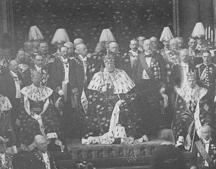 King Oscar II of Sweden, his crown prince Gustaf (V) and grandson Gustaf (VI) Adolf in their crowns and coronets on a state occasion about 1900.