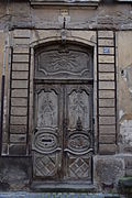 Porte cochère (panneaux Louis XIV) de l'hôtel de Rochely.