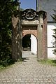 Detached archway in front of the chapel