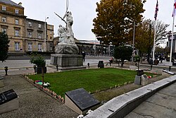 A view of the Kingston upon Hull Cenotaph and the Boer War memorial facing Ferensway on Remembrance Sunday 2023.