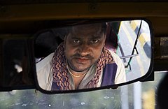 Moto rickshaw driver Delhi India