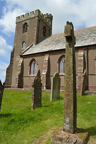 Irton cross - seen in the context of St Paul's Church. The scrolls on the south face are visible. Irton cross 1.jpg