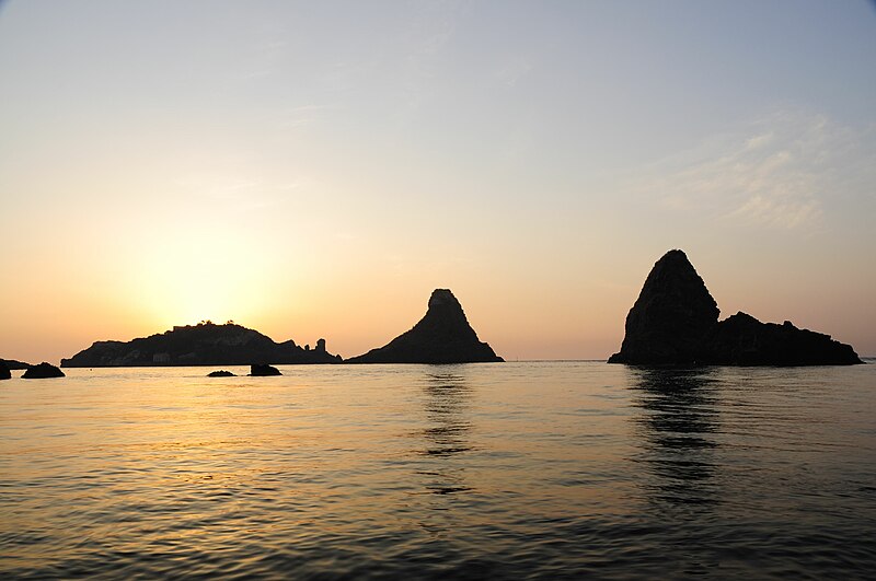 File:Islands of the Cyclops at Dawn Sicily Italy - Creative Commons by gnuckx (5040760942).jpg