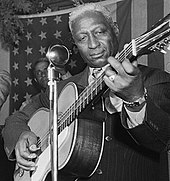 Lead Belly's recordings would be a major part of British R&B repertoires, although he never performed in the UK Leadbelly2byGottliebcropped.jpg