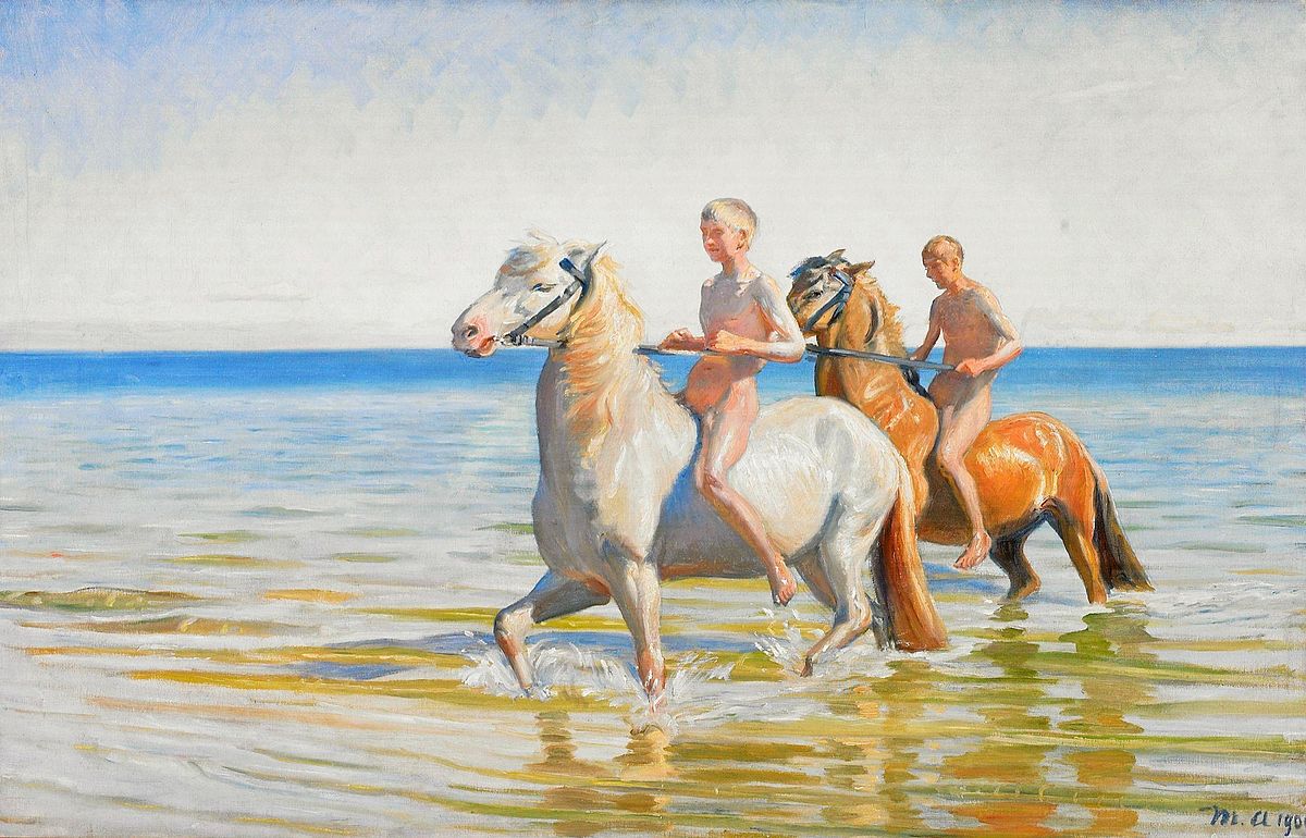 Boys ride horses to water. 