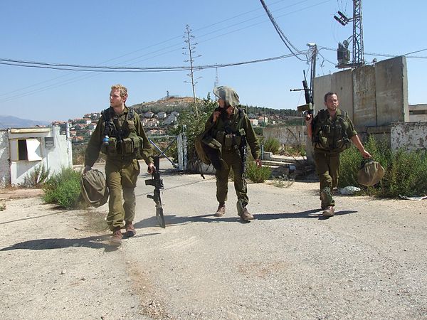 Israeli soldiers coming back from the Second Lebanon war, armed with the M4 Carbine and the IMI Negev light machinegun