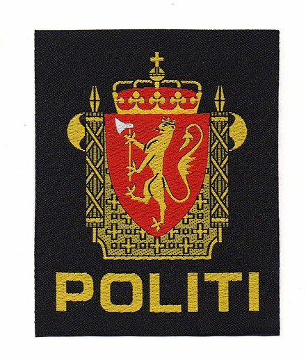 Police patch including the golden lion (insignia for government authorities)