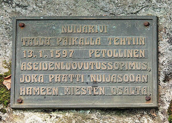 A memorial plaque dedicated to the fallen peasants