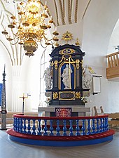 Altaruppsatsen i Öjeby kyrka i Norrbotten är från 1704 och skulpterades i romersk barockstil.