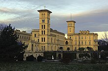 Osborne House on the Isle of Wight, England, built between 1845 and 1851. It exhibits three typical Italianate features: a prominently bracketed cornice, towers based on Italian campanili and belvederes, and adjoining arched windows. Osborne-iow-3Ja10-10914.jpg