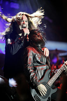 Osbourne performing with bassist Rob Nicholson in April 2013 Ozzy Osbourne & Blasko.jpg