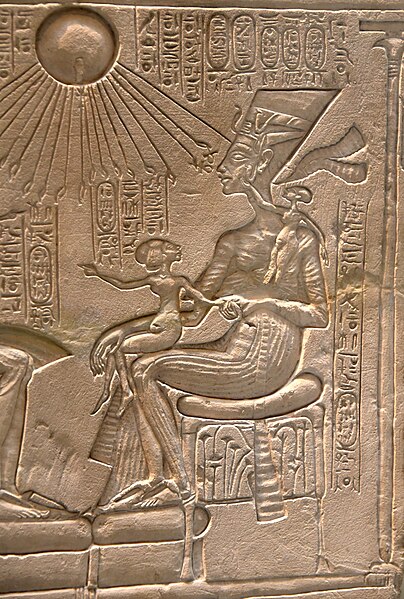 File:Queen Nefertiti and her children, detail of an altarpiece of a shrine. God Aten and his cartouches appear. C. 1345 BCE. From Amarna, Egypt. Neues Museum.jpg