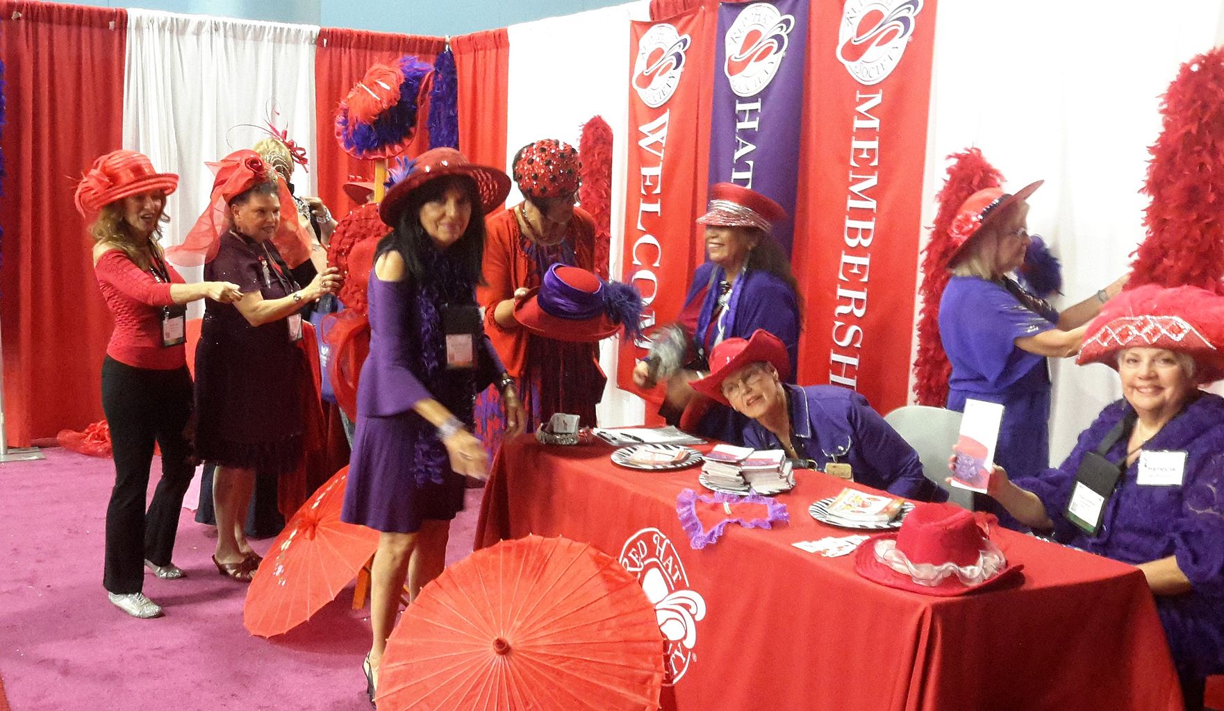 The Red Hat Society booth at the AARP convention in Miami in 2015.