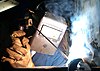 Shielded metal arc welding a pipe