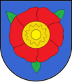 Gemeinde Krautheim In Blau eine rote Blume mit gelbem Butzen und drei, zwei zu eins gestellten, grünen Blättern.[14]