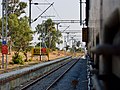 Srirampuram railway station board from a running train