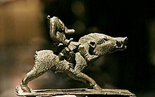 Bronze statuette of the Celtic goddess Arduinna riding a wild boar. Statuette-d'Arduinna.jpg