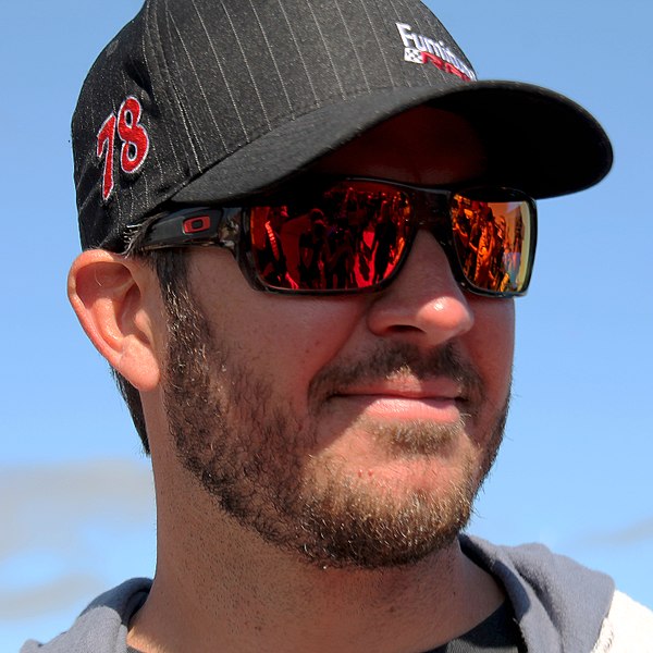 Martin Truex Jr., finished 11 points behind Kyle Busch in fourth place