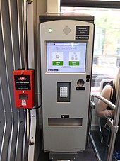 Onboard fare vending machine and concession ticket validator TTC new low-floor streetcar fare vending machine.jpg