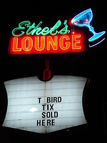 The bar's neon sign at night, 2005. Taco joint (41236378).jpg