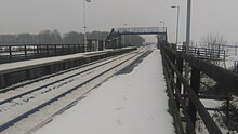 One service stops at Teesside Airport every week on a Sunday, at 14:54, even though it is a 15-minute walk to the airport. Teesside Airport Station - Mar 2018.jpg