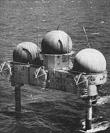 Texas Tower 2; note tropospheric scatter dish antennae on edge of platform Texas Tower 2 radar platform in 1956.jpg