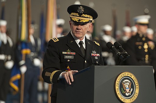 The chairman of the Joint Chiefs of Staff, General Martin Dempsey, speaks during the armed forces farewell tribute in honor of Secretary of Defense Leon E. Panetta