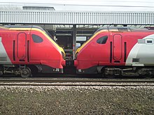 Classes 220 (left) and 221 (right) at Durham, showing the differing bogie designs Trains 2 054.JPG